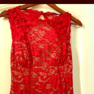Red lace event dress with nude slip underneath